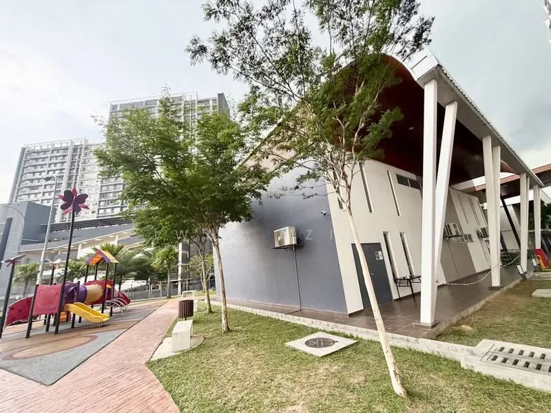 Exterior type: clubhouse; features: modern architectural design, flat roof, grey painted facade, large windows, covered outdoor area, surrounded by greenery, playground with slides and swings, paved walkway, manicured lawn, adjacent to high-rise buildings; style: modern.