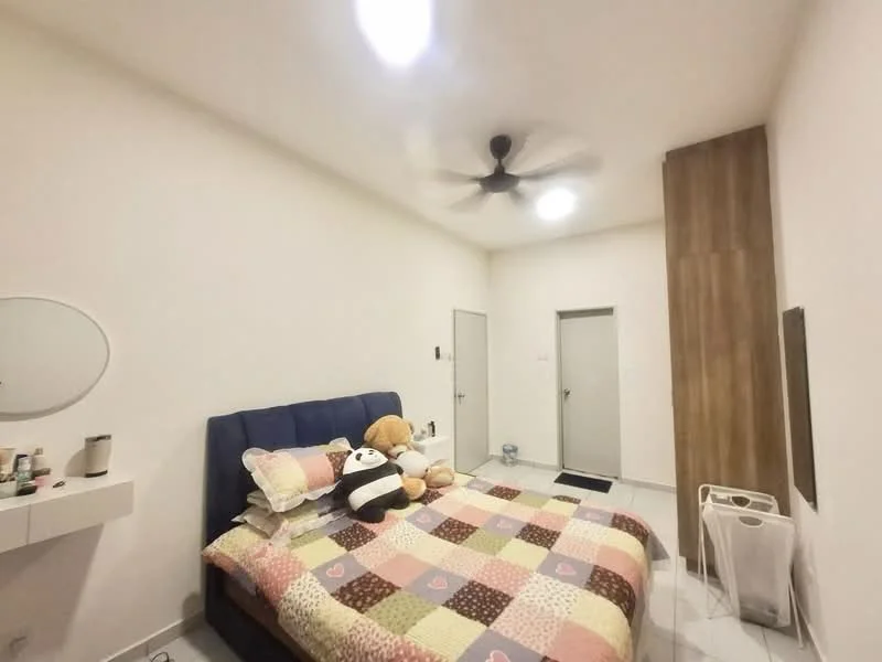 Bedroom features: queen-size bed with patchwork quilt, upholstered headboard in navy blue, 5-blade ceiling fan, white painted walls, light grey tiled flooring, built-in wardrobe with sliding doors, decorative mirror on wall, stuffed animals on bed, nightstand with lamp, door leading to hallway; style: modern.