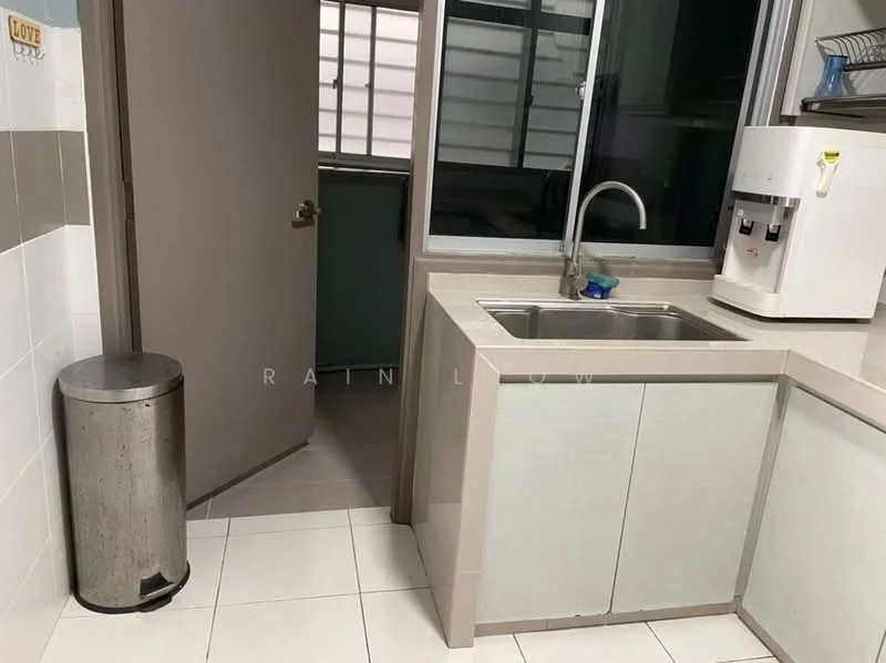 Kitchen features: single-bowl stainless-steel sink, chrome pull-down faucet, light-colored cabinetry, countertop with light finish, white tiled flooring, refrigerator, trash bin, window with grid pattern, door leading to another room; style: modern.