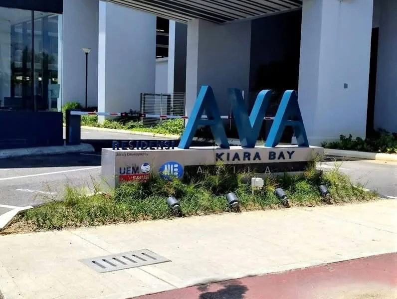 Exterior features: large sign with 'AVA' in blue letters, landscaped area with grass and small plants, paved walkway, modern architectural elements, lighting fixtures, surrounding building structure; style: modern.