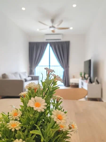 Living features: 5-blade ceiling fan with light, floor-to-ceiling windows, grey fabric sofa, TV console, wall-mounted TV, light-colored walls, recessed downlights, curtains, decorative plant on table, wooden dining table, area rug; style: modern; view: city.