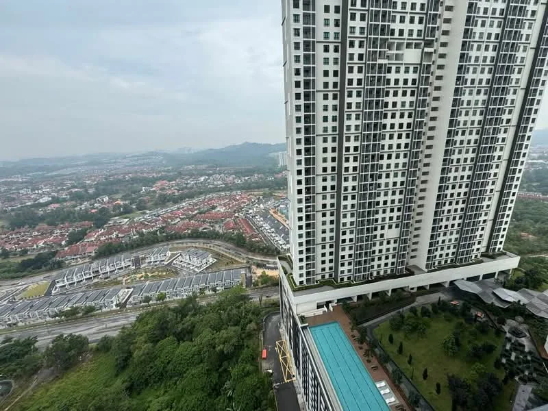 Exterior type: high-rise condominium; features: glass curtain wall, recessed balconies, approximately 30-storey high-rise, surrounded by mature greenery, view of city skyline, landscaped garden at base, parking deck visible, adjacent to highway; style: modern.