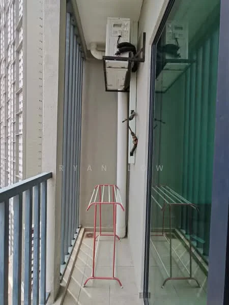 Room features: balcony, glass sliding door, metal railing, exposed concrete walls, floor-mounted air conditioning unit, grey tiled flooring, clothes drying rack.