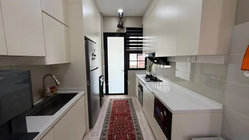 Kitchen features: white cabinetry, stainless-steel fridge, single-bowl stainless-steel sink, chrome pull-down faucet, white quartz countertop, black gas hob, built-in oven, tile backsplash, recessed downlights, window with black frame, red patterned runner rug; style: modern.