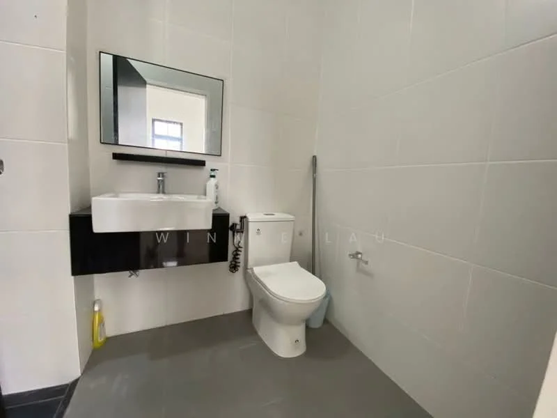 Bathroom features: white wall tiles, grey floor tiles, wall-mounted sink, chrome faucet, framed mirror, one-piece toilet, toilet paper holder, shower hose, soap dispenser; style: modern.