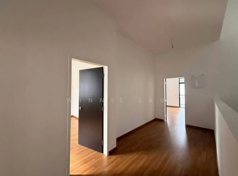 Room features: white painted walls, wooden flooring, door with dark finish, door frame with white trim, large windows, high ceiling, open layout, natural light; style: modern.