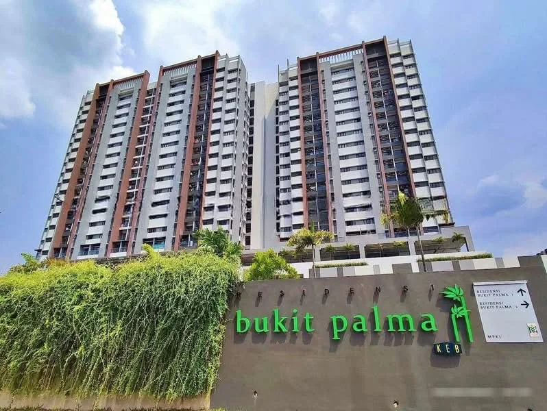 Exterior type: high-rise condominium; features: glass curtain wall, white painted facade, recessed balconies, vertical fins, landscaped entrance, signage with green lettering, surrounded by greenery, multiple storeys, modern architectural design; style: modern.
