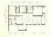 Floor plan: 3-bedroom 2-bathroom unit; features: open-plan kitchen-dining-living, master bedroom with ensuite bathroom, bedroom 2 with shared bathroom, utility room, central foyer, balcony off living room, private yard, 2 car porch.