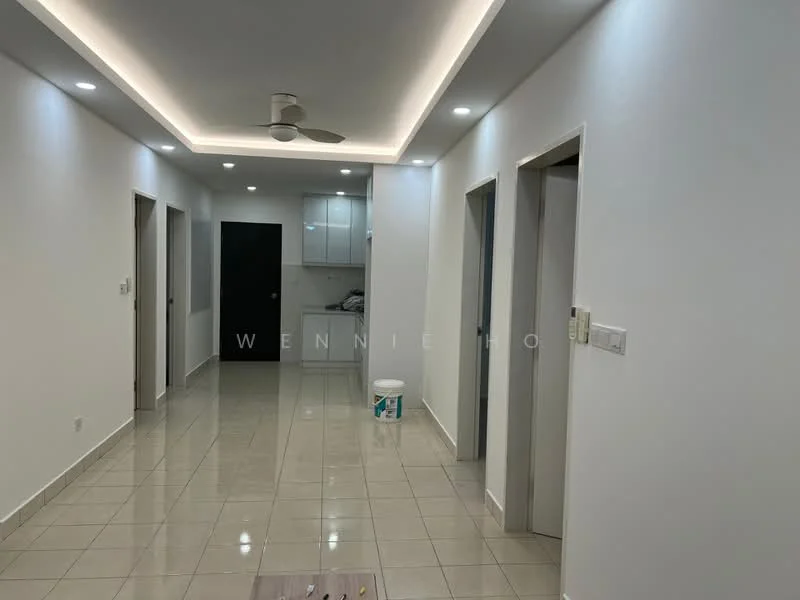 Hallway features: white painted walls, glossy tile flooring, recessed downlights, 5-blade ceiling fan, doorways leading to other rooms, neutral color palette, smooth ceiling with cove lighting; style: modern. Kitchen features: white cabinetry, countertop, kitchen appliances visible in background; style: modern.