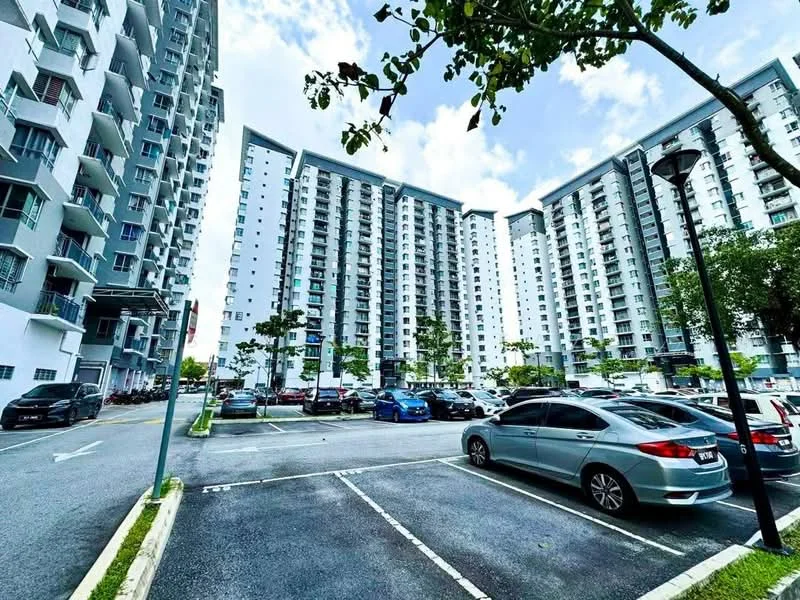 Exterior type: high-rise condominium; features: multiple high-rise buildings, modern facade with glass and concrete, landscaped greenery, parking lot with marked spaces, surrounded by trees, outdoor lighting, open-air parking, urban setting; style: modern.