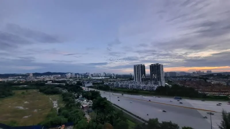 Exterior type: high-rise condominium; features: city skyline view, multiple high-rise buildings, highway visible, green landscape in foreground, urban setting, sunset lighting; style: modern.