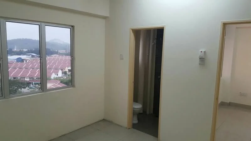 Room features: white painted walls, tile flooring, large window with view, doorway leading to bathroom, visible toilet in bathroom, neutral color scheme, light switch on wall, corner of room with no furniture; style: modern; view: city.