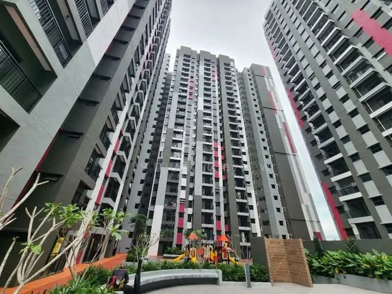 Exterior type: high-rise condominium; features: modern facade with grey and red accents, multiple storeys visible, surrounded by landscaped gardens, playground area visible, balconies on upper floors, glass windows, concrete structure, manicured greenery, pathway leading through the garden; style: modern.