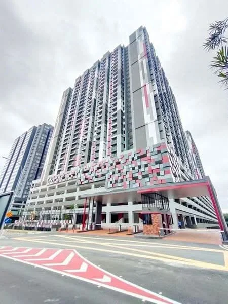 Exterior type: high-rise condominium; features: multi-storey building, modern facade with colorful paneling, ground-level parking area, covered entrance, large windows, balconies on upper floors, landscaped surroundings, urban context with nearby buildings; style: modern.