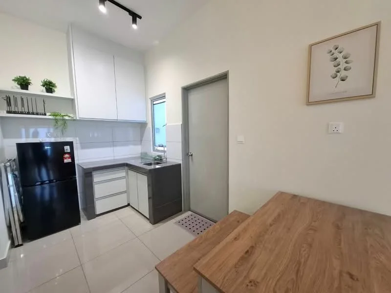 Kitchen features: white cabinetry, grey lower cabinets, stainless-steel sink, chrome pull-down faucet, black refrigerator, white countertop, ceramic tile backsplash, wall-mounted shelving, recessed downlights, dining table with wooden surface, tile flooring, window, door, decorative wall art; style: modern.