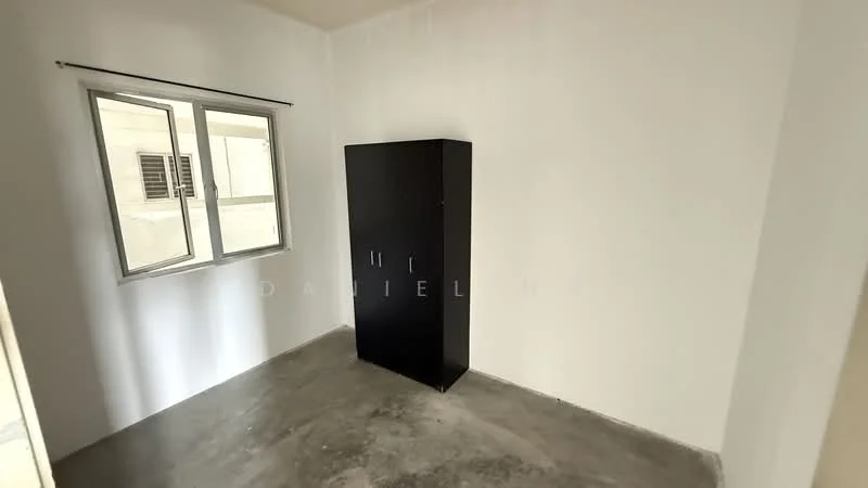 Room features: white painted walls, concrete flooring, single window, black wardrobe.