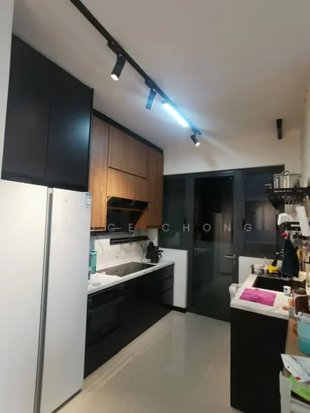 Kitchen features: black cabinetry, wood cabinetry, marble countertop, stainless-steel fridge, built-in oven, 4-burner gas hob, black range hood, single-bowl stainless-steel sink, chrome pull-down faucet, track lighting, white walls, polished tile flooring; style: modern.