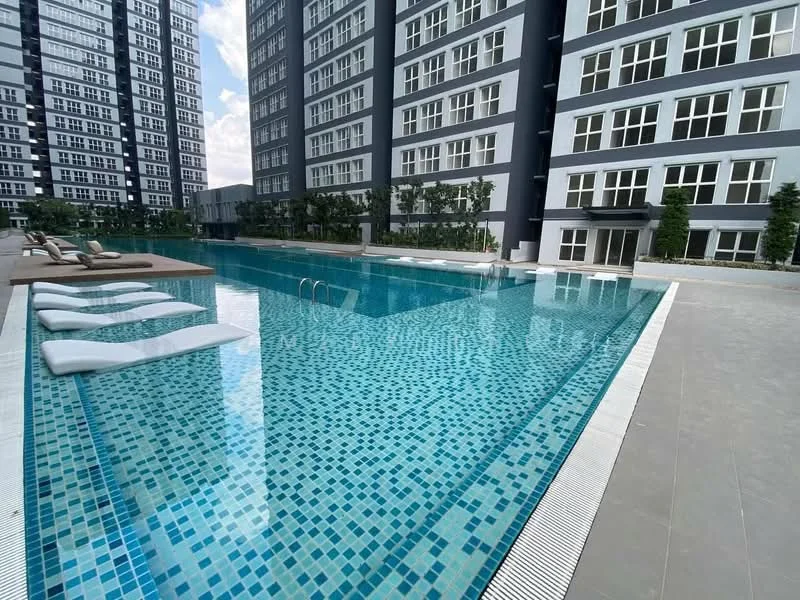 Exterior type: high-rise condominium; features: infinity pool, pool deck with loungers, surrounding landscaping with greenery, modern architectural design, multiple high-rise buildings, glass curtain wall facade, tiled pool surface with mosaic pattern, outdoor seating area; style: modern.