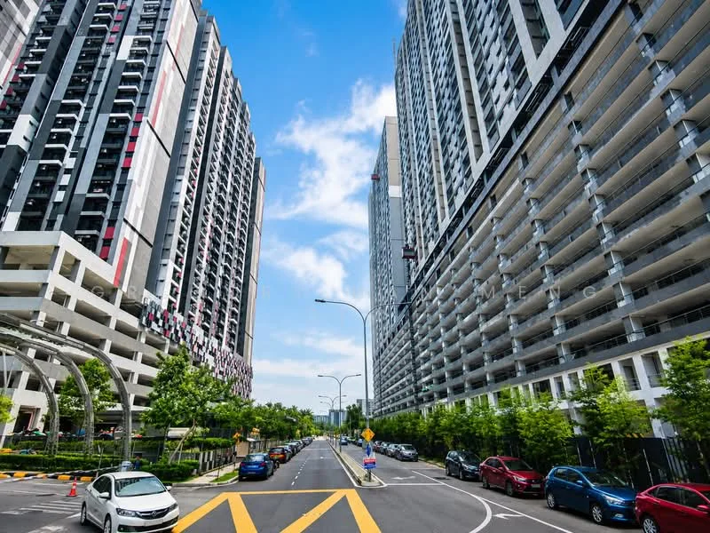 Exterior type: high-rise condominium; features: glass curtain wall, exposed concrete facade, recessed balconies, multiple storeys, surrounded by greenery, manicured landscaping, wide road access, parking spaces visible, urban context with skyline view, modern architectural design; style: modern.