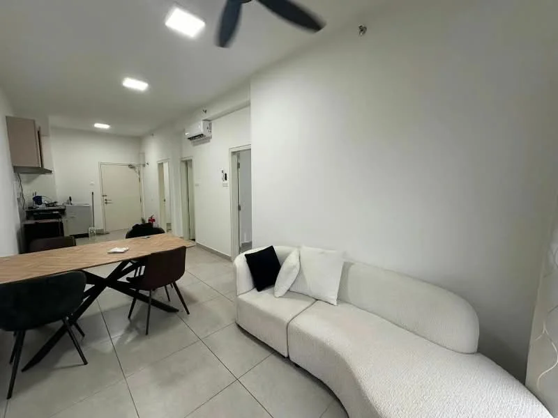 Living features: curved fabric sofa in white, dining table with wooden surface, 4 upholstered dining chairs in dark color, wall-mounted split AC, recessed LED downlights, grey tiled flooring, white painted walls, ceiling fan, open layout, doorway leading to other rooms; style: modern.