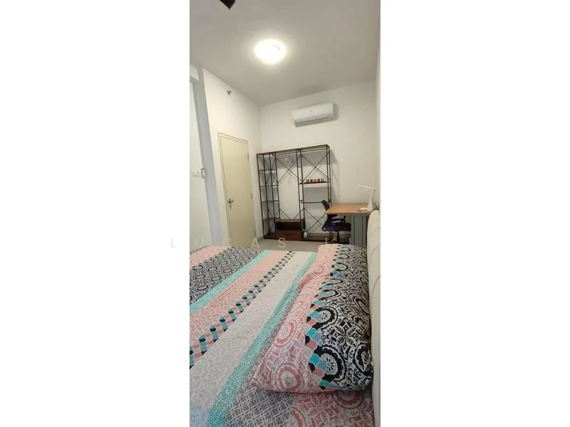 Bedroom features: queen-size bed with patterned bedding, wall-mounted air conditioning unit, study desk with lamp, open shelving unit, white painted walls, light-colored flooring, ceiling light fixture; style: modern.