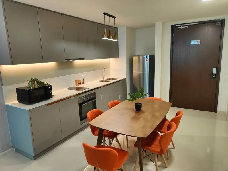 Kitchen features: grey flat-panel cabinets, white quartz countertop, double-bowl stainless-steel sink, chrome pull-down faucet, built-in oven, freestanding fridge, microwave, 4-seater dining table, orange upholstered dining chairs, recessed downlights, white tiled backsplash, polished ceramic tile flooring; style: modern.