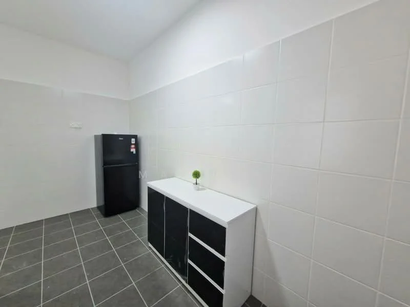 Kitchen features: white tiled walls, grey floor tiles, black refrigerator, white cabinet with black drawers, small decorative plant on countertop.