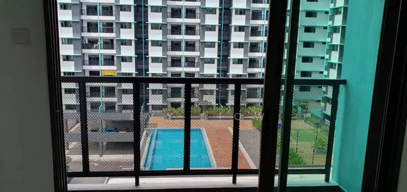 Room features: balcony with metal railing, floor-to-ceiling sliding glass door, view of swimming pool, view of landscaped area, concrete flooring, green wall paint, white walls, window treatments not visible; style: modern; view: pool.