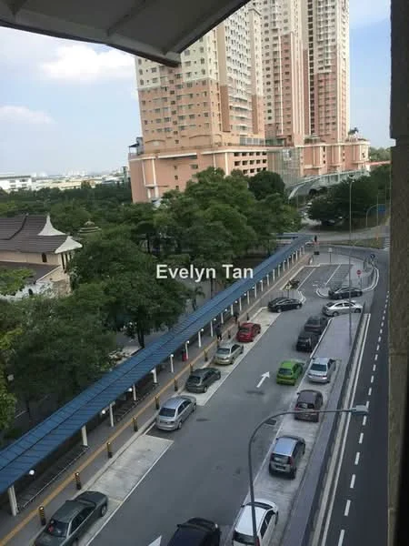 Exterior type: high-rise condominium; features: multi-storey building, glass curtain wall, surrounded by greenery, open-air parking lot, road with marked lanes, pedestrian walkway, nearby trees, urban context; style: modern.