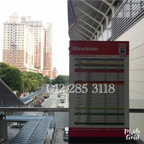 Exterior type: high-rise condominium; features: glass curtain wall, surrounded by mature greenery, urban context, visible street view, near public transport station, multiple high-rise buildings in background; style: modern.
