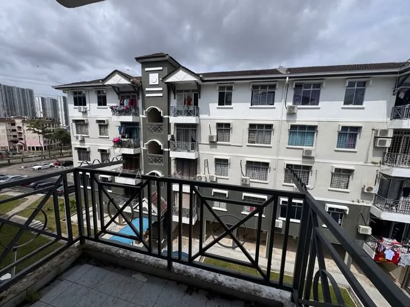 Exterior type: low-rise apartment block; features: grey painted facade, balconies with metal railings, visible air conditioning units, manicured lawn, paved walkway, surrounded by urban landscape, multiple storeys, parking area visible, laundry hanging on balconies; style: modern.