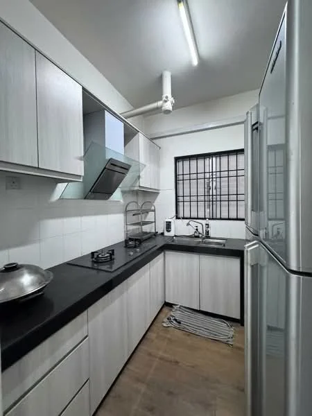 Kitchen features: white laminate cabinetry, black countertop, stainless-steel fridge, built-in gas hob, stainless-steel range hood, sink, wall-mounted kitchen shelf, window with security bars, tile backsplash, wooden flooring, overhead lighting; style: modern.
