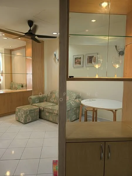 Living features: 3-seater fabric sofa in green with patterned upholstery, ottoman, round dining table, 4 dining chairs, white tiled flooring, built-in wooden cabinetry, glass display shelves, recessed downlights, ceiling fan, wall-mounted artwork; style: modern.