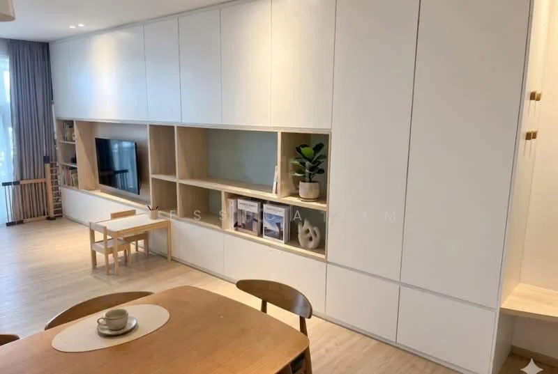 Living features: white cabinetry with open shelving, built-in TV unit, light wood accents, light wood dining table, wooden dining chairs, decorative plant on shelf, neutral wall color, laminate flooring, large windows with natural light, minimalist decor; style: modern.