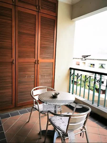 Balcony features: wooden sliding door, metal railing, round table, two metal chairs, ceramic floor tiles, built-in wooden storage cabinets, overhead light fixture, potted plant.