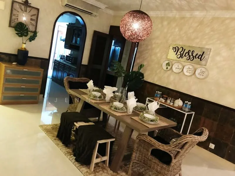 Dining features: wooden dining table, 4 wicker dining chairs, decorative table setting with plates and napkins, greenery centerpiece, pendant light fixture, wall-mounted decor with the word 'Blessed', cream wall paint, tile flooring, air conditioning unit on ceiling, decorative wall art, open archway leading to another room; style: modern. Room features: cream painted walls, dark wood cabinetry, recessed lighting, glass door refrigerator visible in background.