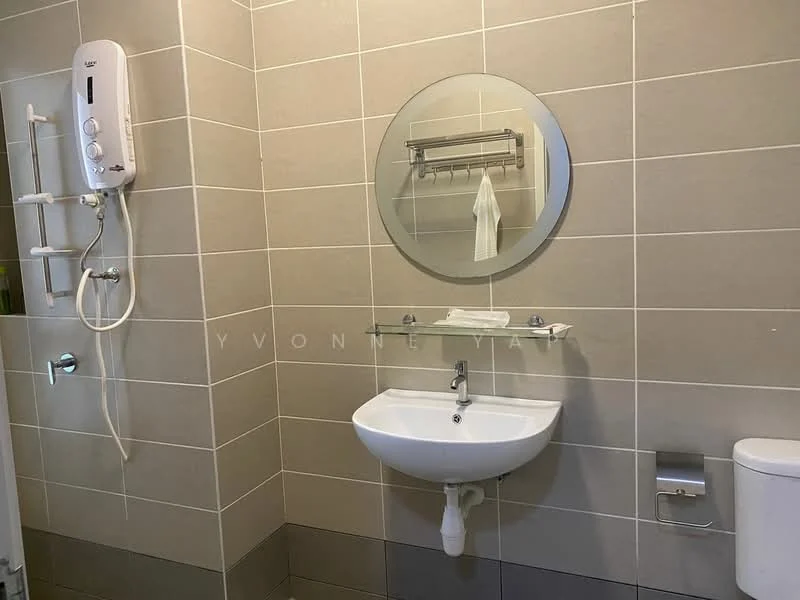 Bathroom features: grey tiled walls, white ceramic sink, chrome basin mixer faucet, round mirror, glass shelf, towel rack, white toilet, shower panel with controls, chrome showerhead, wall-mounted soap dispenser, toilet paper holder; style: modern.