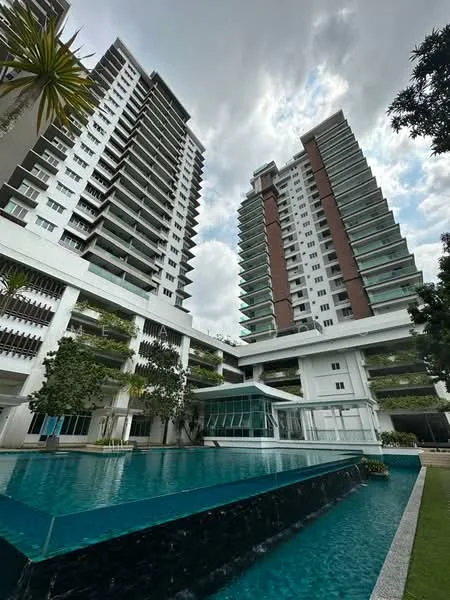 Exterior type: high-rise condominium; features: glass curtain wall, white painted facade, green balconies, water feature in foreground, manicured landscaping, paved walkway, surrounded by palm trees, two tall buildings, outdoor seating area, skyline view, cloudy sky; style: modern.
