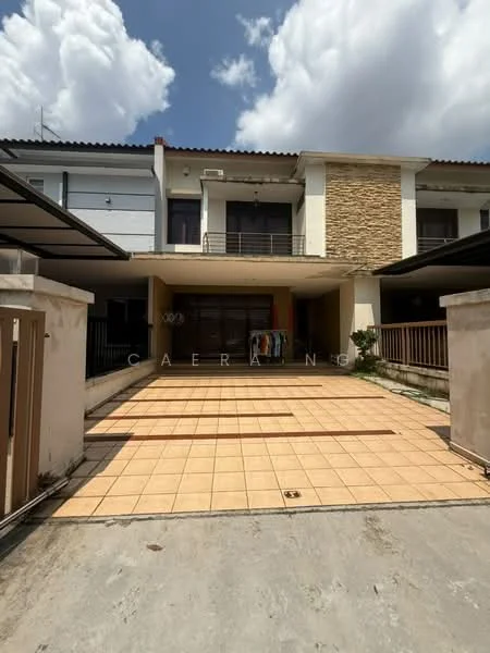 Exterior type: linked terrace house; features: two-storey building, cream painted facade, stone cladding accents, tiled driveway, covered car porch, balcony on upper floor, manicured landscaping, laundry hanging on balcony, clear blue sky, sunlight casting shadows; style: modern.