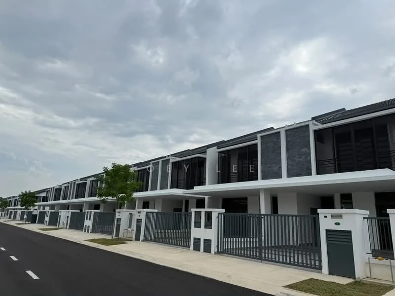 Exterior type: linked terrace house; features: two-storey building, grey stone cladding, white painted facade, flat roof, recessed balconies, manicured landscaping, paved walkway, gated entry, modern design, multiple units in row; style: modern.