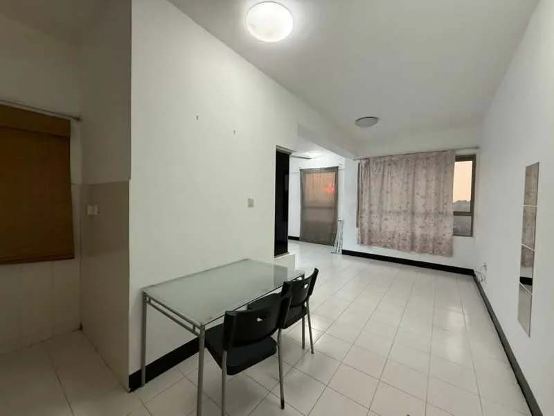 Room features: white painted walls, tile flooring, ceiling light fixture, large window with sheer curtains, dining table with four chairs, mirror on wall, window with blinds, corner of room with no visible furniture; style: minimalist; view: city.