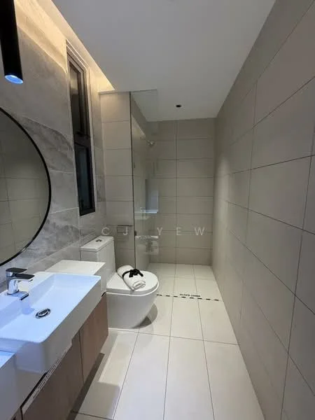 Bathroom features: white ceramic toilet, single-sink vanity with wood cabinet, chrome basin mixer faucet, round mirror, grey marble accent wall, white tiled walls, light-colored floor tiles, glass shower enclosure; style: modern.