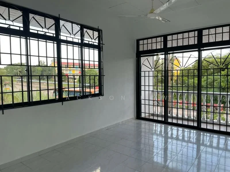 Room features: white painted walls, glossy tile flooring, large windows with black metal grilles, ceiling fan, natural light from windows, view of greenery outside, sliding glass door, open space layout; style: modern; view: garden.