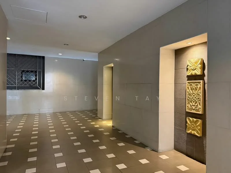 Room features: cream painted walls, grey accent wall, tile flooring, recessed downlights, decorative wall panel with floral design, square pattern on floor tiles, open corridor layout, wall-mounted lighting fixtures; style: modern.