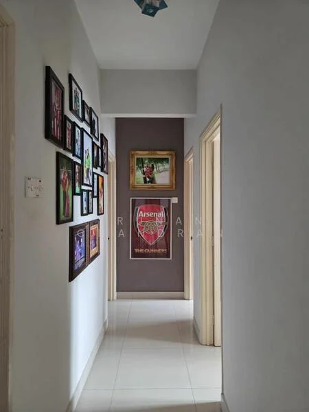 Hallway features: white painted walls, grey accent wall, glossy tile flooring, framed artwork on walls, decorative wall art, doorway leading to another room, ceiling light fixture; style: modern.