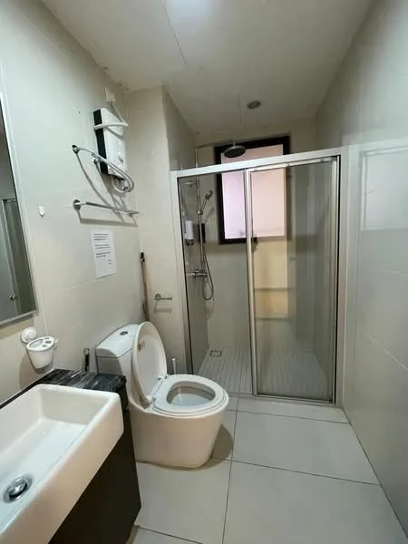 Bathroom features: white ceramic toilet, single-sink vanity with dark cabinet, chrome basin mixer faucet, glass shower enclosure, rain shower head, handheld shower, white tiled walls, light grey tiled flooring, mirror above vanity, wall-mounted soap dispenser, window for natural light; style: modern.