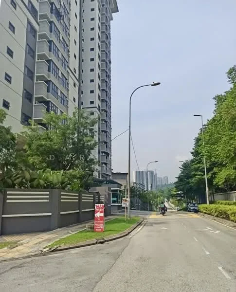 Exterior type: high-rise condominium; features: grey concrete facade, glass windows, surrounded by greenery, manicured landscaping, street view, signage at entrance, paved walkway, street lighting, adjacent to road; style: modern.