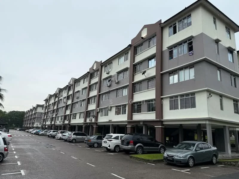 Exterior type: low-rise apartment block; features: grey painted facade, cream painted facade, multiple storeys, covered parking area, open-air parking lot, balconies on upper floors, windows with grills, paved driveway; style: modern.