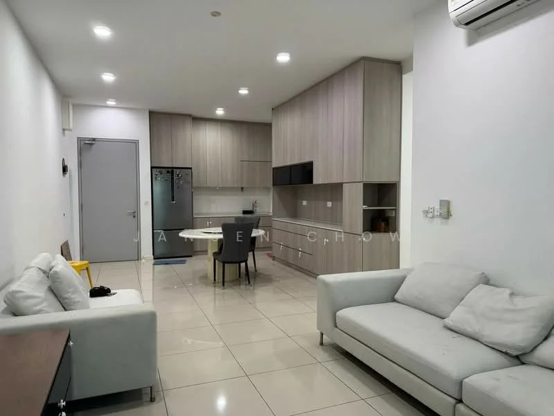 Living features: white painted walls, glossy ceramic tile flooring, recessed downlights, 2-seater fabric sofa in light grey, 3-seater fabric sofa in light grey, wooden coffee table, black dining table with 4 chairs, kitchen cabinetry in light wood finish, built-in refrigerator, kitchen countertop in white, open kitchen layout, air conditioning unit on wall; style: modern.