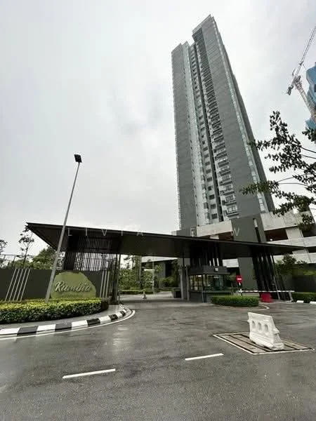 Exterior type: high-rise condominium; features: modern facade with glass and concrete, double-volume main lobby, landscaped entrance with greenery, covered entrance canopy, surrounded by mature trees, driveway with interlocking pavers; style: modern.
